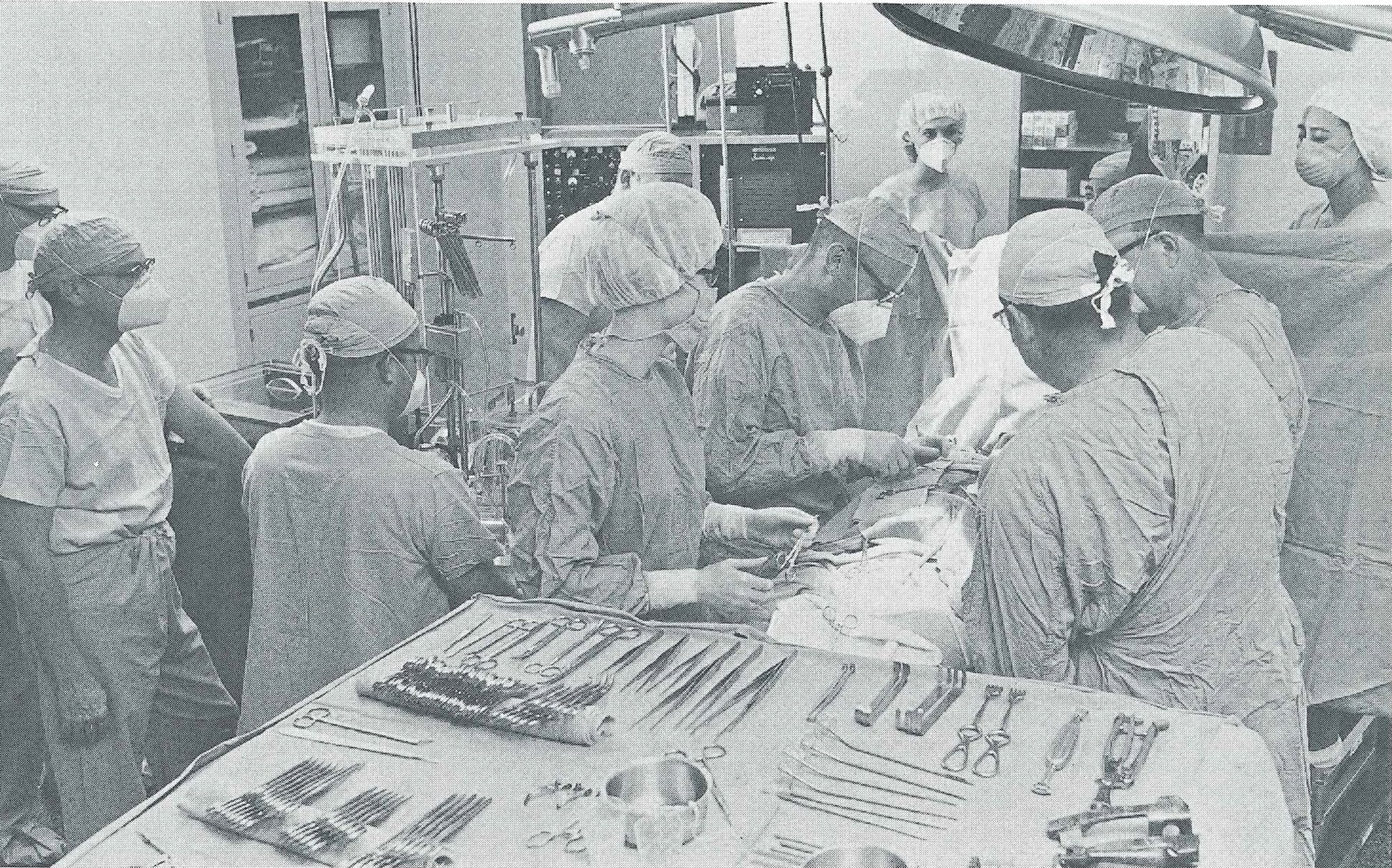 Doctor standing looking at paperwork